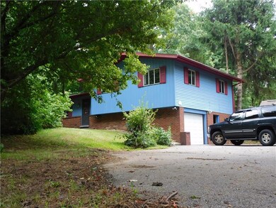 Driveway and integral garage with plenty of space.