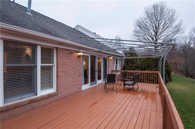 Walk out to huge, covered deck from living room.