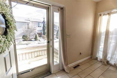 The entry is bright with ceiling to floor window a