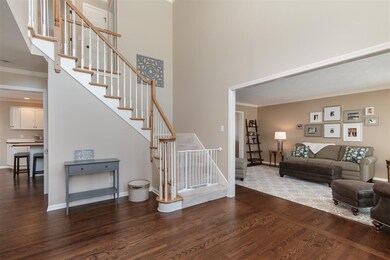 Gleaming hardwood flooring extends into Formal Liv