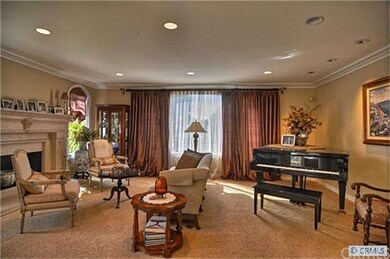 FORMAL LIVING ROOM WITH FIREPLACE & WETBAR