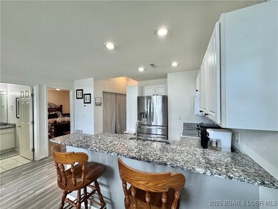 New flooring, beautiful kitchen with granite count