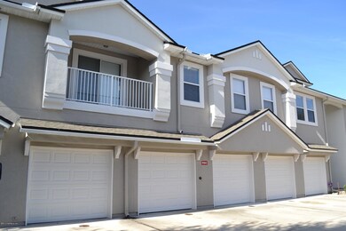 End unit with balcony and garage