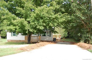 NEW DECK ON FRONT AND SIDE OF HOME.