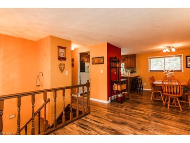 Newer wood floors line the main living space.