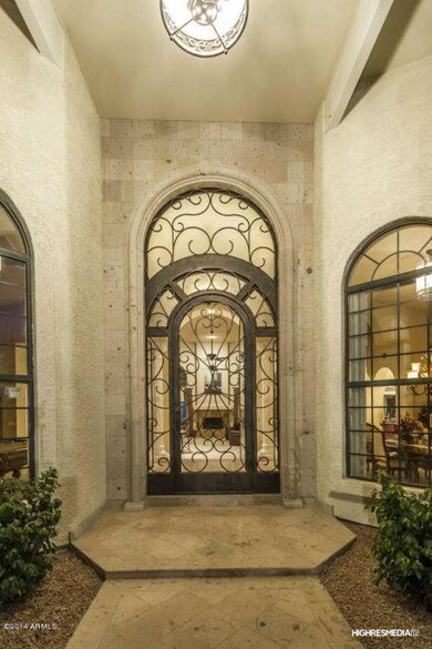 Evening Shot of Gorgeous Iron Front Door