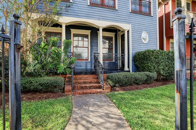 Brick steps lead you to the front porch.