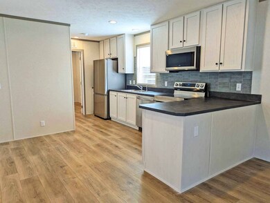 1306 Chateau Cir unit 62, Findlay, OH 45840 - photo 3