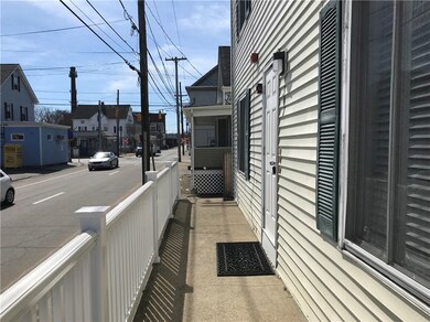 Front entrance of building. Metacom Ave. faces eas
