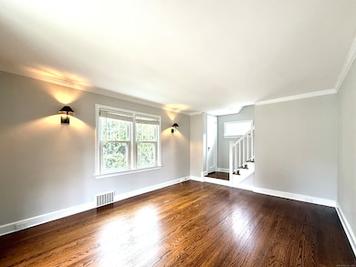 Large living room with hardwoods floors