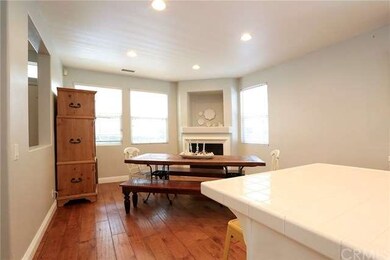 View of Partial Island in Kitchen and Fireplace wi