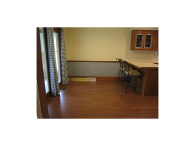 Walk out into the sun room from the kitchen