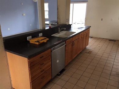 Kitchen cabinets as part of open floor plan