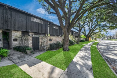 Charming Condo complex with a rustic exterior, fea
