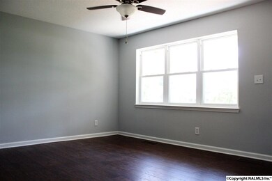 Engineered hardwood flooring throughout the majority of the house.