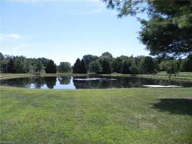 Closest pond to the home has a stationary and floa