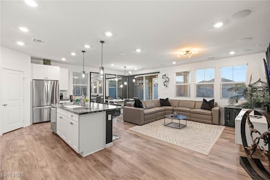 Kitchen featuring appliances with stainless steel