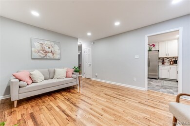 View of hardwood floored living room
