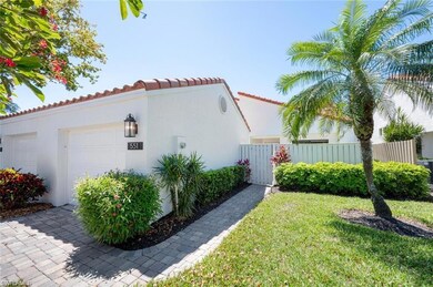View of property exterior featuring a lawn area