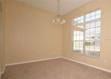 The dining room is big with a wonderfully large wi