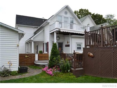 Exterior Back. Fully fenced rear yard, multi tired