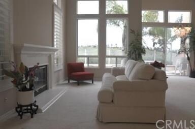 Bright and airy living room with fire place