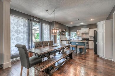 Main floor family room, dining area and kitchen ar