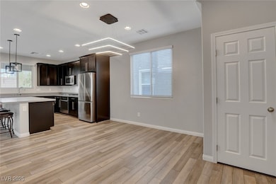 Kitchen with appliances with stainless steel finis