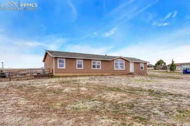 View of front of property featuring fence