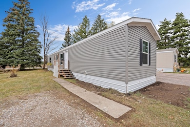 Pristine Greystone single-wide home on a spacious lot in the Foothills Mobile Park community