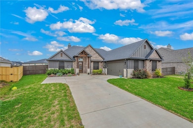 house featuring driveway, board and batten siding,