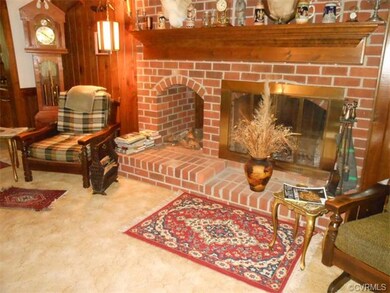 large Family room with brick hearth Fireplece