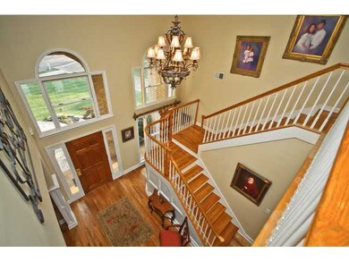 Beautiful two-story foyer with Nail-down Hardwood 