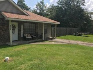 across front of home both lots