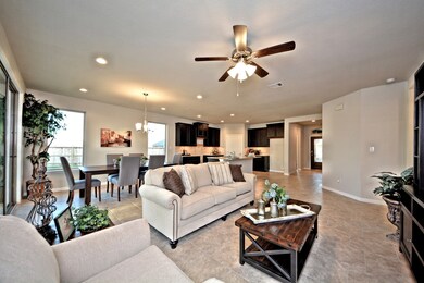 Family Room has also the beautiful Large Tile Floors that flows into the Casual Dining and Gourmet Kitchen!