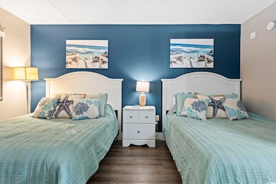 Bedroom featuring wood finished floors