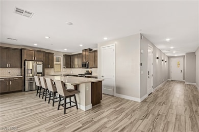 Kitchen with appliances with stainless steel finis