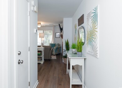 Hall featuring hardwood / wood-style floors