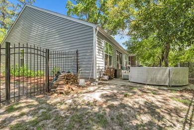 View of property exterior with fence