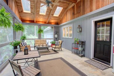 Screened porch with cathedral ceilings, skylights,