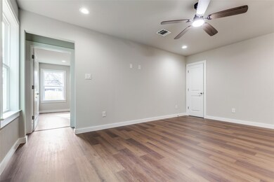Spare room featuring baseboards, visible vents, ce