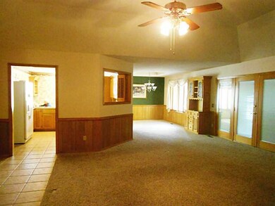 Living Room. Easy flow floor plan,notice the pass through from kitchen