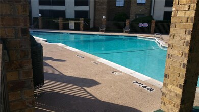 Community pool with fence