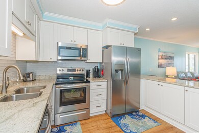 Kitchen featuring appliances with stainless steel 