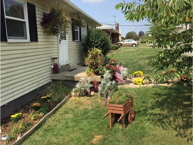 Exterior Front. FRESHLY LANDSCAPED