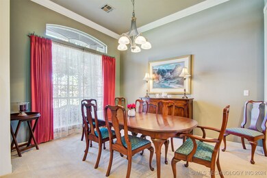 Formal dining room off entry.