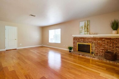 Beautiful brick fireplace will keep you cozy in th