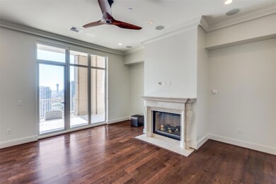 Unfurnished living room with ornamental molding, a