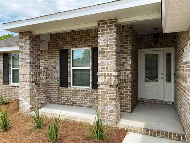 Relax & unwind on this inviting front porch.