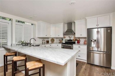 Carrera Marble Counters, Subway Tile Back Splash.